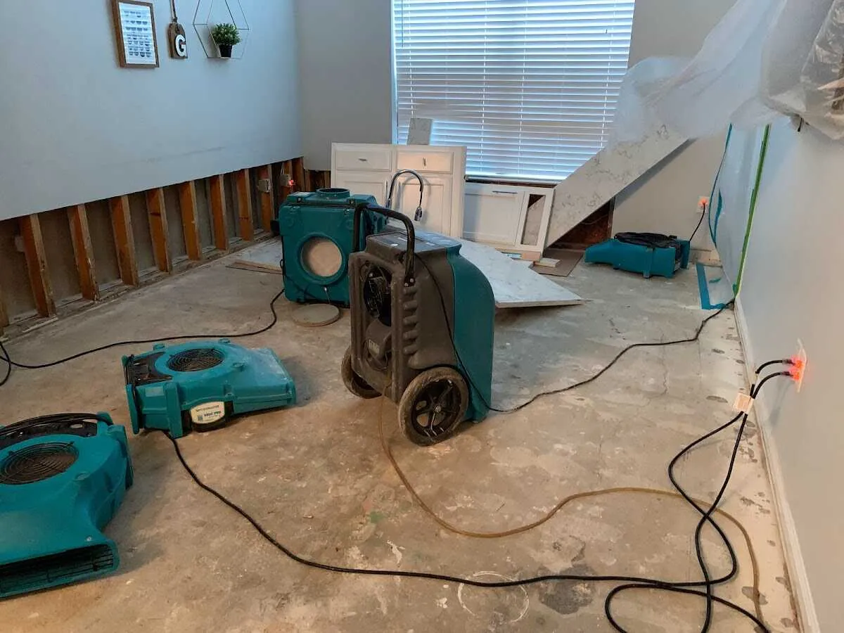 Dehumidifier in flood-cut room for Water Damage Restoration in Woodland